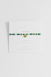 Product shot of the Beaded Evil Eye Bracelet in colour Green (Green), from the front