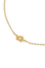 Product shot of the Knot Bracelet – Gold in colour Gold, showing detail