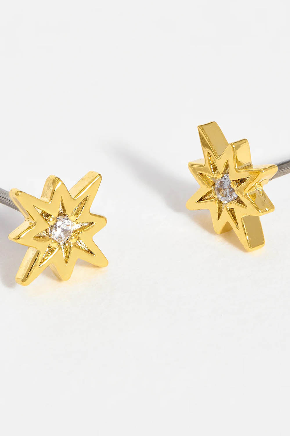 Product shot of the North Star Stud Earrings in colour Gold (Metallics), detail