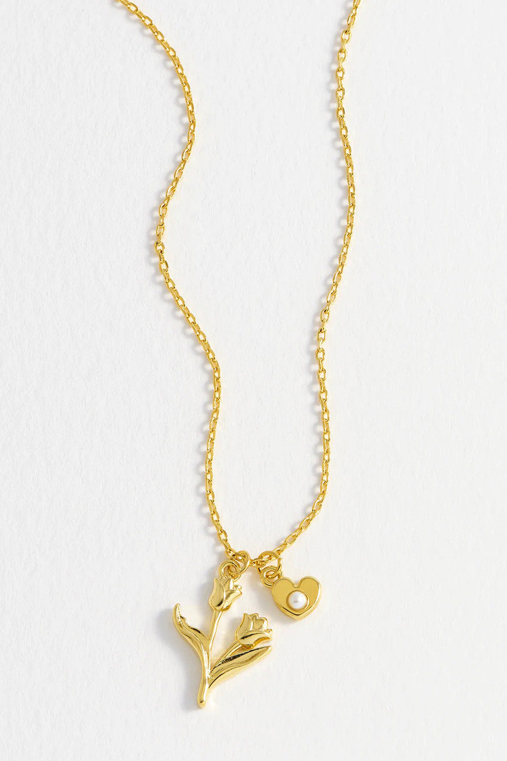 Product shot of the Tulip And Heart Necklace in colour Gold (Metallics), detail