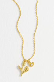 Product shot of the Tulip And Heart Necklace in colour Gold (Metallics), detail