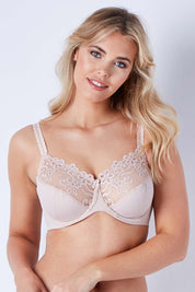 Model Phoebe wearing size 12DD of the Coral Underwire DDin colourG Cup Bra - Latte, from the front, cropped image