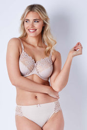 Model Phoebe wearing size 12DD of the Coral Underwire DDin colourG Cup Bra - Latte, from the front, cropped image