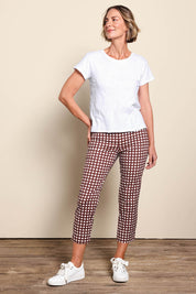 Model Riinar wearing size 10 of the Fuss Free Cotton Blend Taper Capri Trapeze Pant – Checkit in colour Checkit, from the front