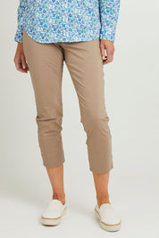 Model Emma wearing size 10 of the Fuss Free Cotton Blend 7/8 Taper Capri in colour Latte, from the front, cropped image
