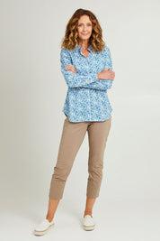 Model Emma wearing size 10 of the Fuss Free Cotton Blend 7/8 Taper Capri in colour Latte, from the front, showing the whole outfit