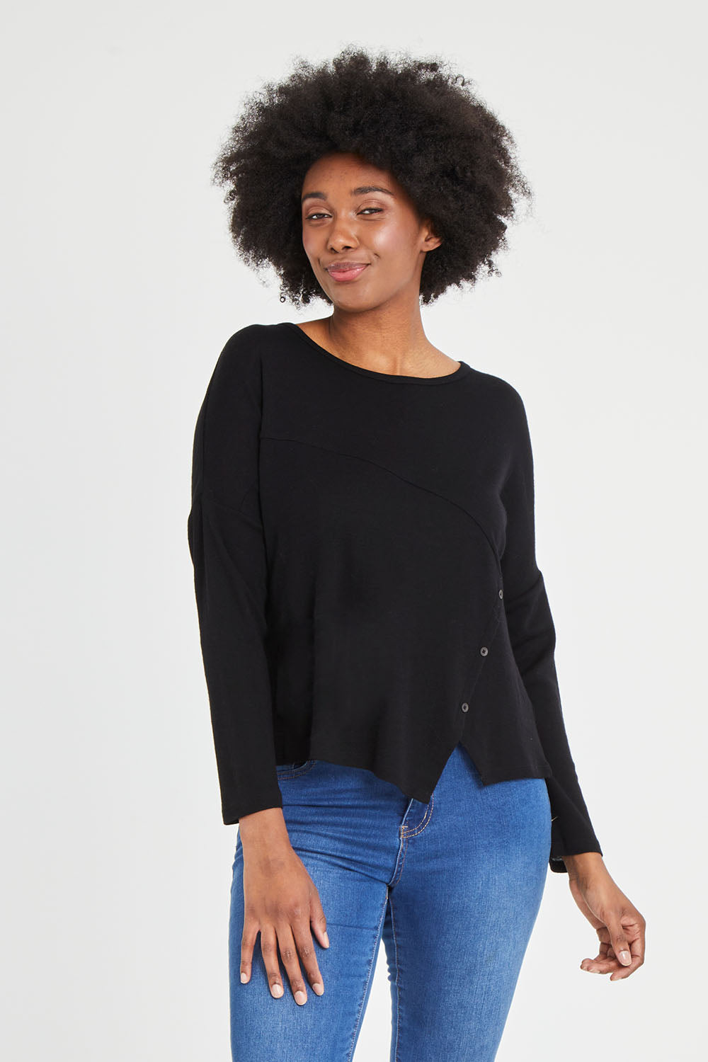 Model Aiyana wearing size S of the Patch Of The Day Top in colour Black (Black), from the front, cropped image