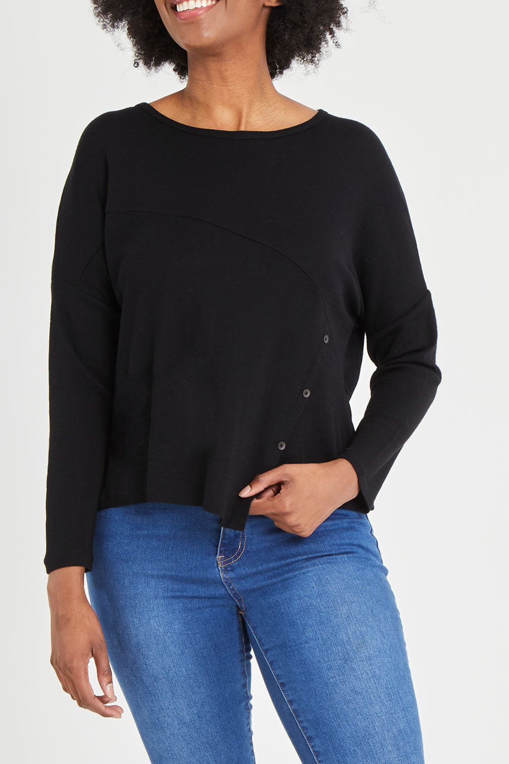 Model Aiyana wearing size S of the Patch Of The Day Top in colour Black (Black), from the front, cropped image