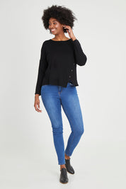 Model Aiyana wearing size S of the Patch Of The Day Top in colour Black (Black), from the front, showing the whole outfit