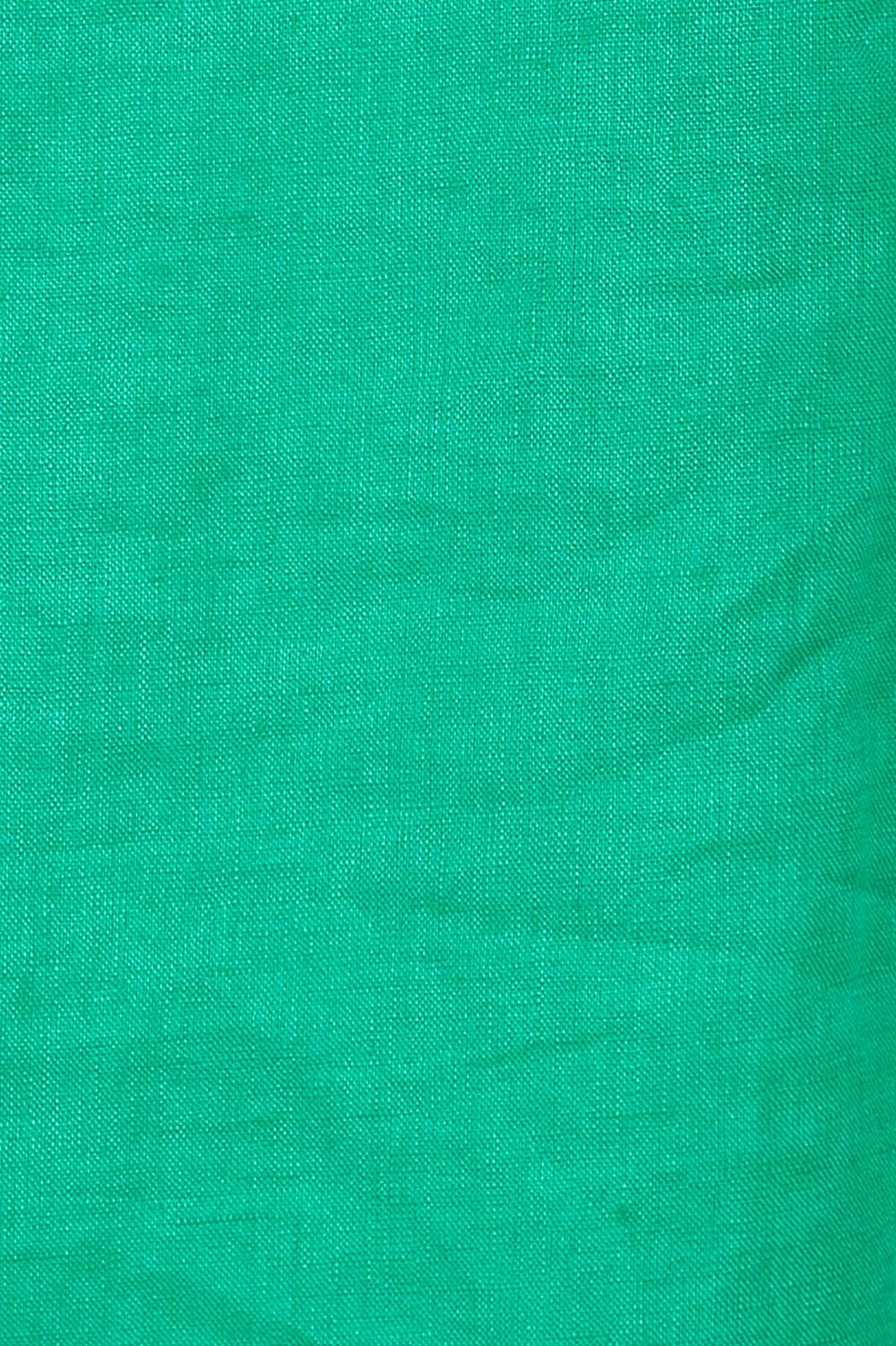Product shot of the Fringe Benefits Linen Dress in colour Jade (Green), detail