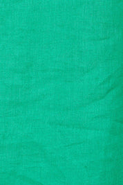 Product shot of the Fringe Benefits Linen Dress in colour Jade (Green), detail