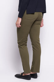 A model wearing the Holey Moleskin Trouser in colour Hunter (Green), from the back