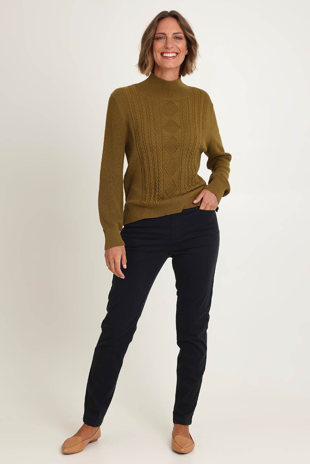 Model Riina wearing size 10 of the Holey Moleskin Trouser in colour Indigo (Blue), from the front, showing the whole outfit
