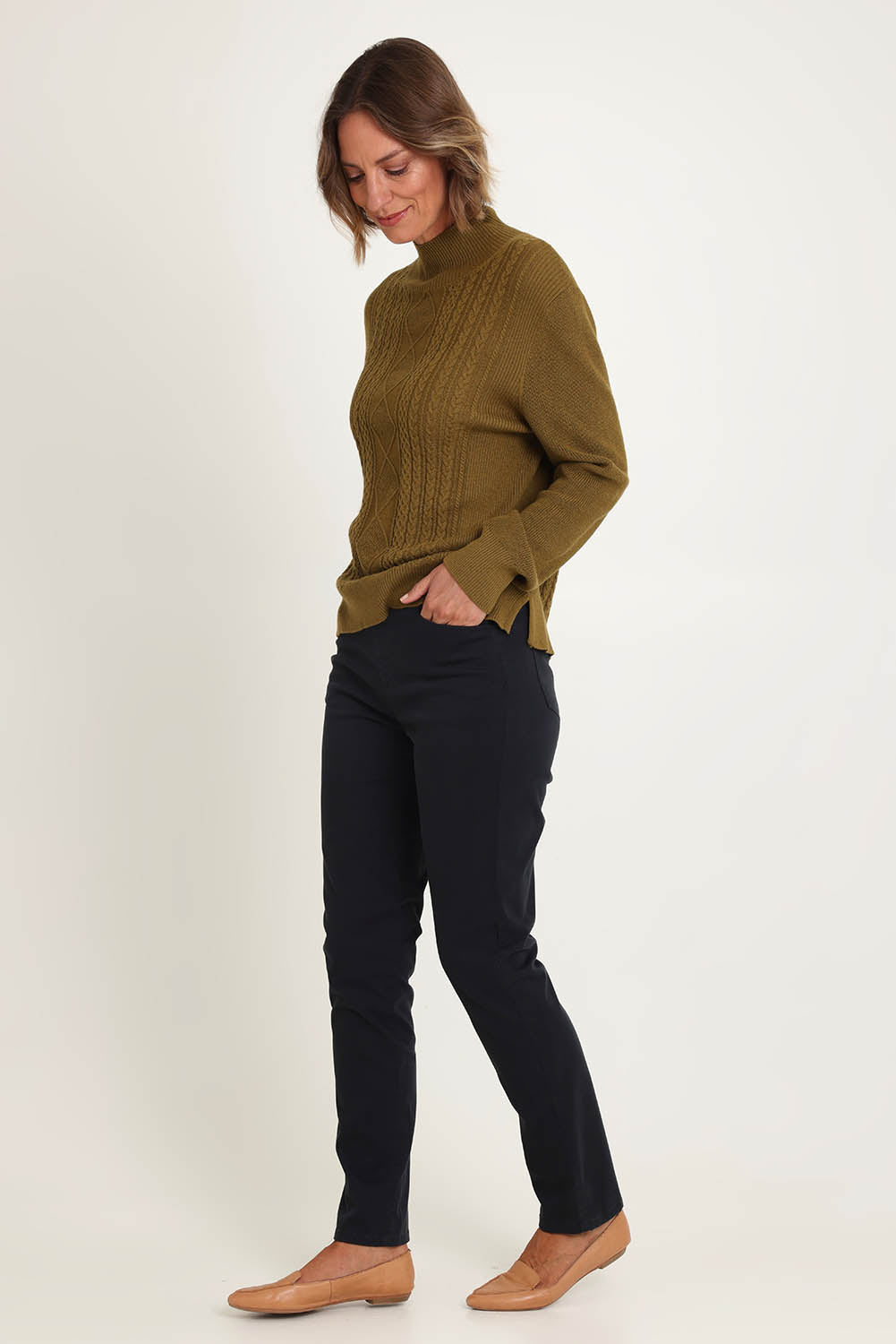 Model Riina wearing size 10 of the Holey Moleskin Trouser in colour Indigo (Blue), from the front, showing the whole outfit
