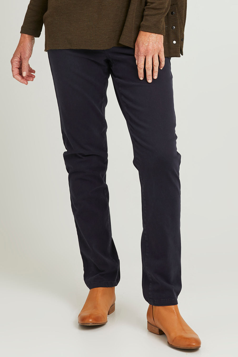 Model Emma wearing size 10 of the Holey Moleskin Trouser in colour Midnight (Blue), from the front, cropped image