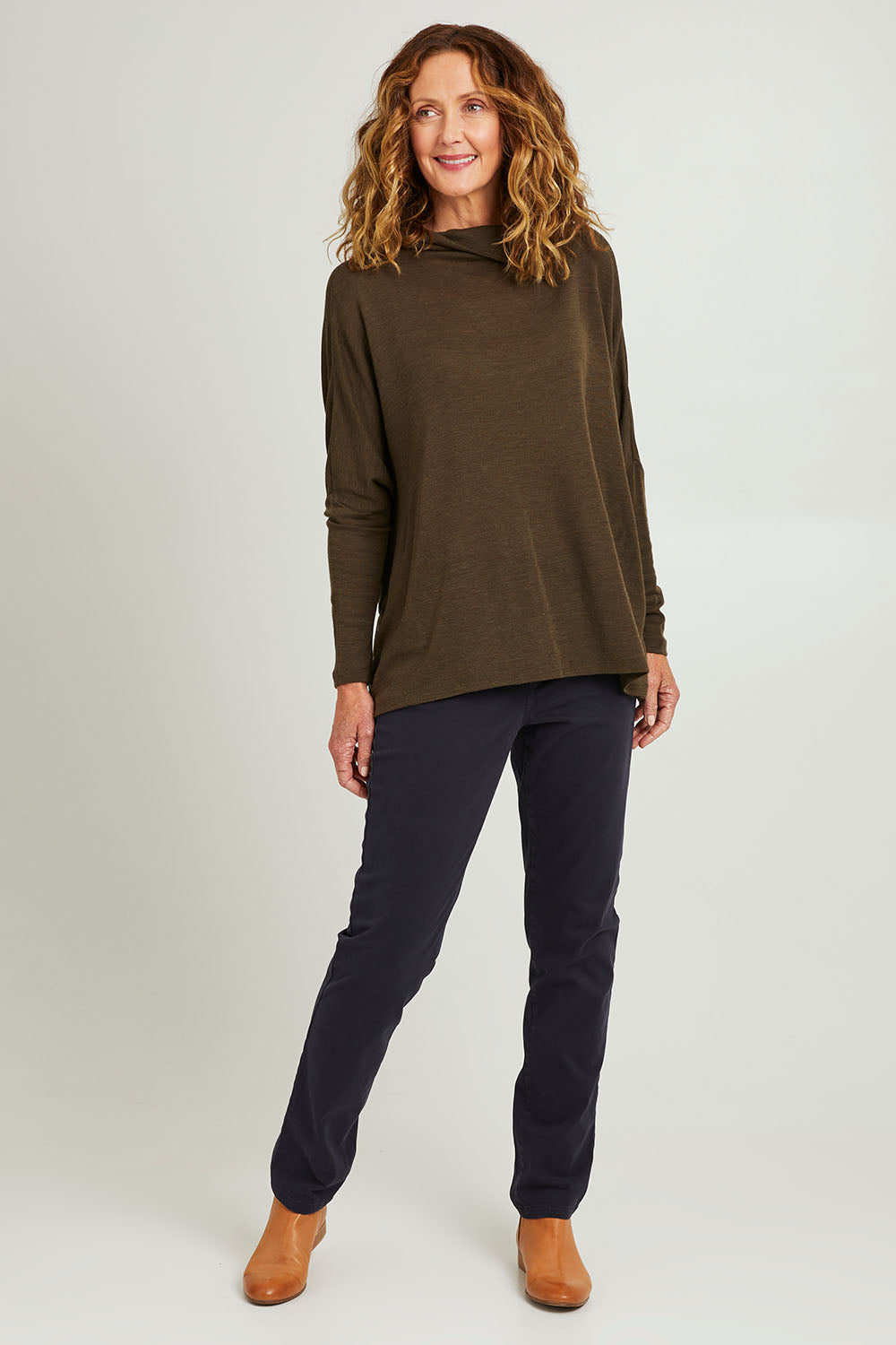 Model Emma wearing size 10 of the Holey Moleskin Trouser in colour Midnight (Blue), from the front, showing the whole outfit
