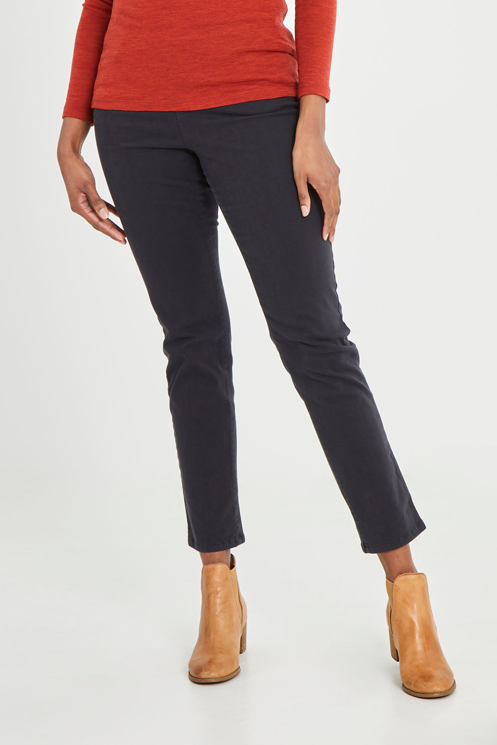 Model Aiyana wearing size 10 of the Holey Moleskin Trouser in colour Truenavy (Blue), from the front, cropped image