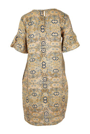 Product shot of the Truly Frilling Linen Dress in colour Ornate, from the back