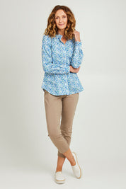 Model Emma wearing size 10 of the All Class Shirt in colour Water (Blue), from the front, showing the whole outfit