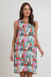 Model Madeline wearing size 10 of the Sunin colourSational Linen Dress - Fusion, from the front, cropped image