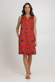 Model Madeline wearing size 10 of the Sunin colourSational Linen Dress - Palmcove, from the front, showing the whole outfit