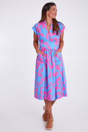Model Alex wearing size 10 of the Its A Stunner Dress in colour Duo (Blue), from the front, showing the whole outfit