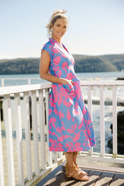 Model Phoebe wearing size 10 of the Its A Stunner Dress in colour Duo (Blue), from the front, showing the whole outfit