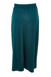 Product shot of the A Game Merino Skirt in colour Jeep (Green), from the back