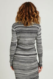 Model Emma wearing size S of the Space Jam Sweater in colour Blkivory (Black), from the back