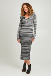 Model Emma wearing size S of the Space Jam Sweater in colour Blkivory (Black), from the front, showing the whole outfit