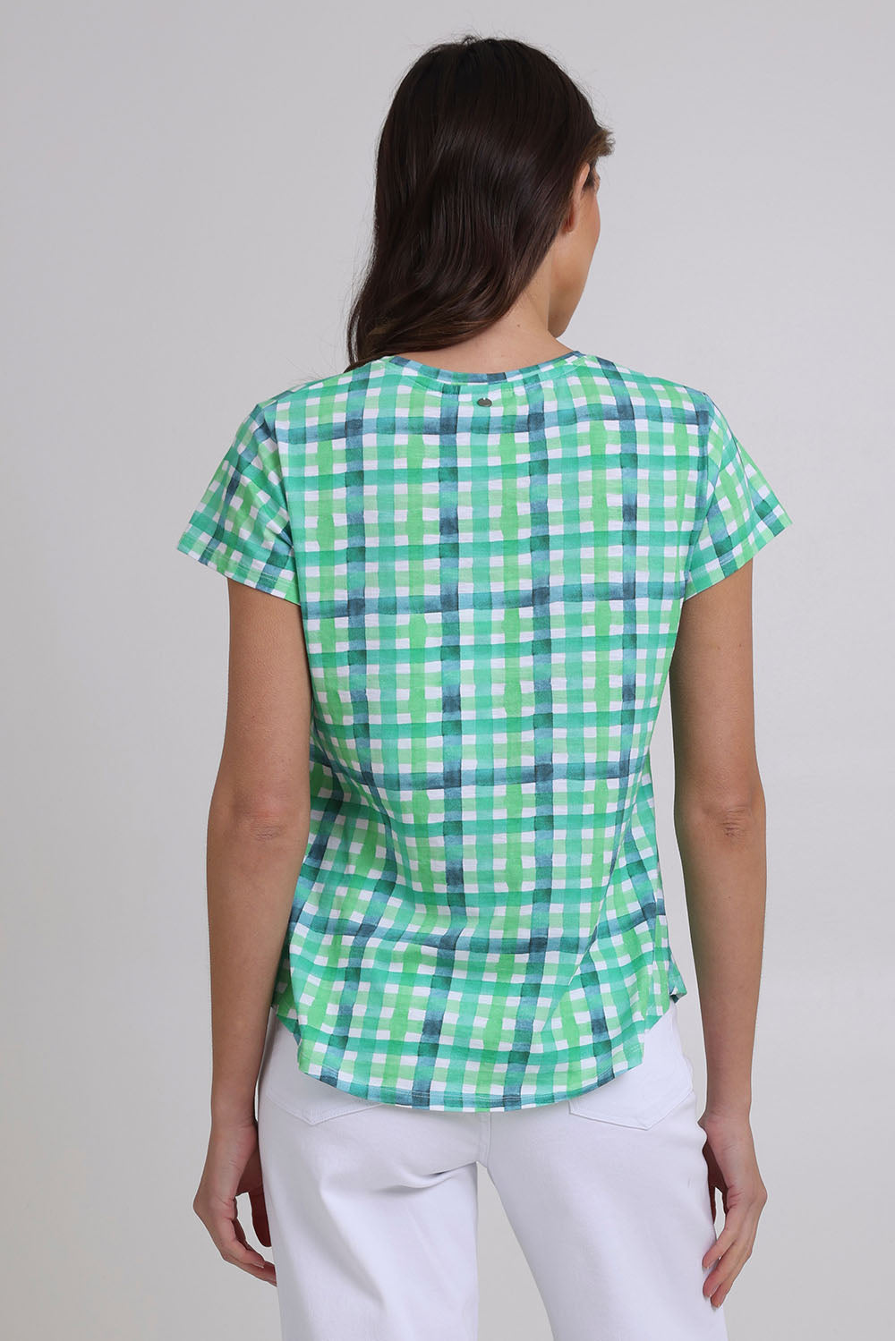 Model Madeline wearing size S of the Vs So Fine Cotton Tee in colour Edgy (Green), from the back