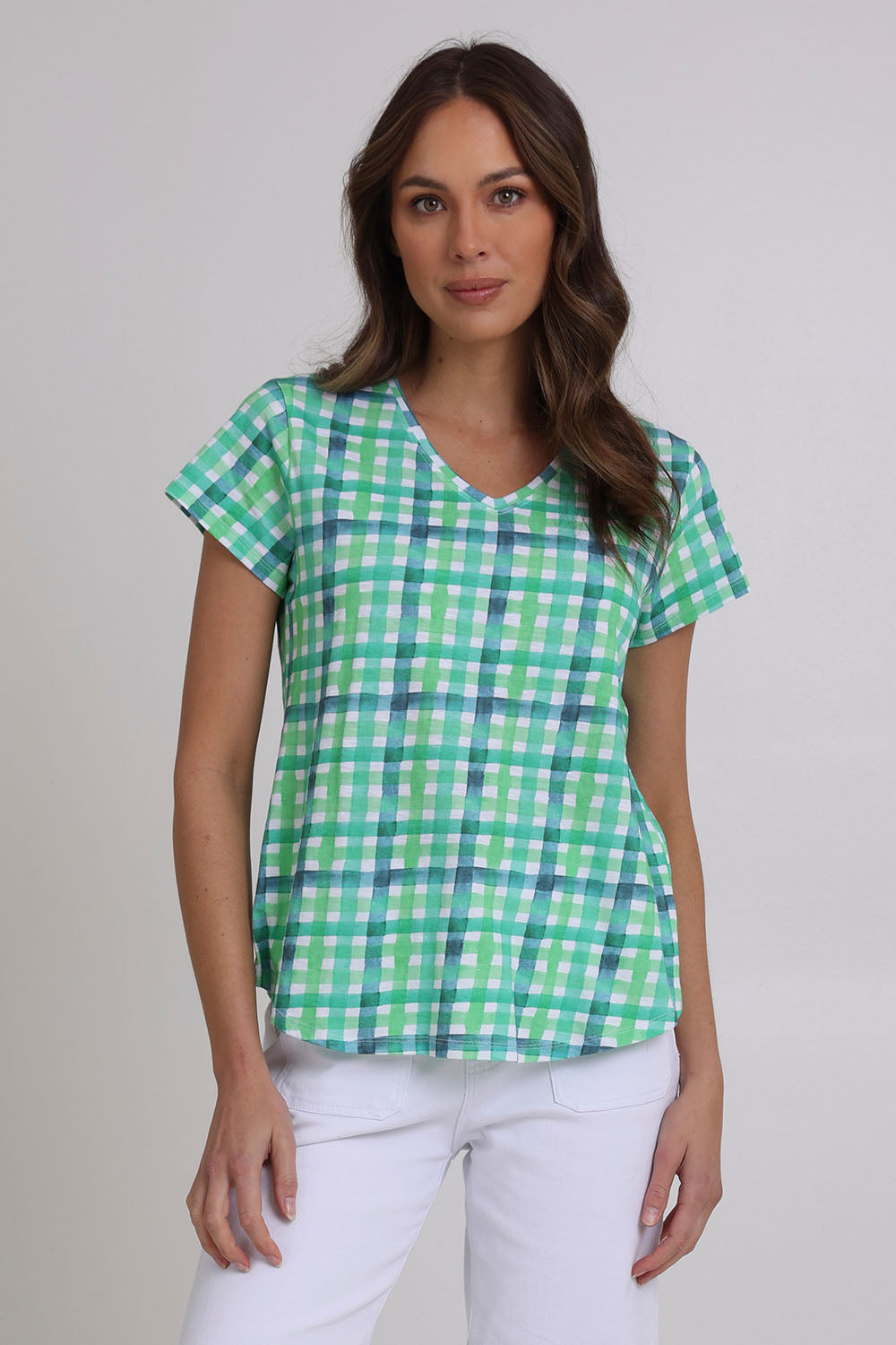 Model Madeline wearing size S of the Vs So Fine Cotton Tee in colour Edgy (Green), from the front, cropped image