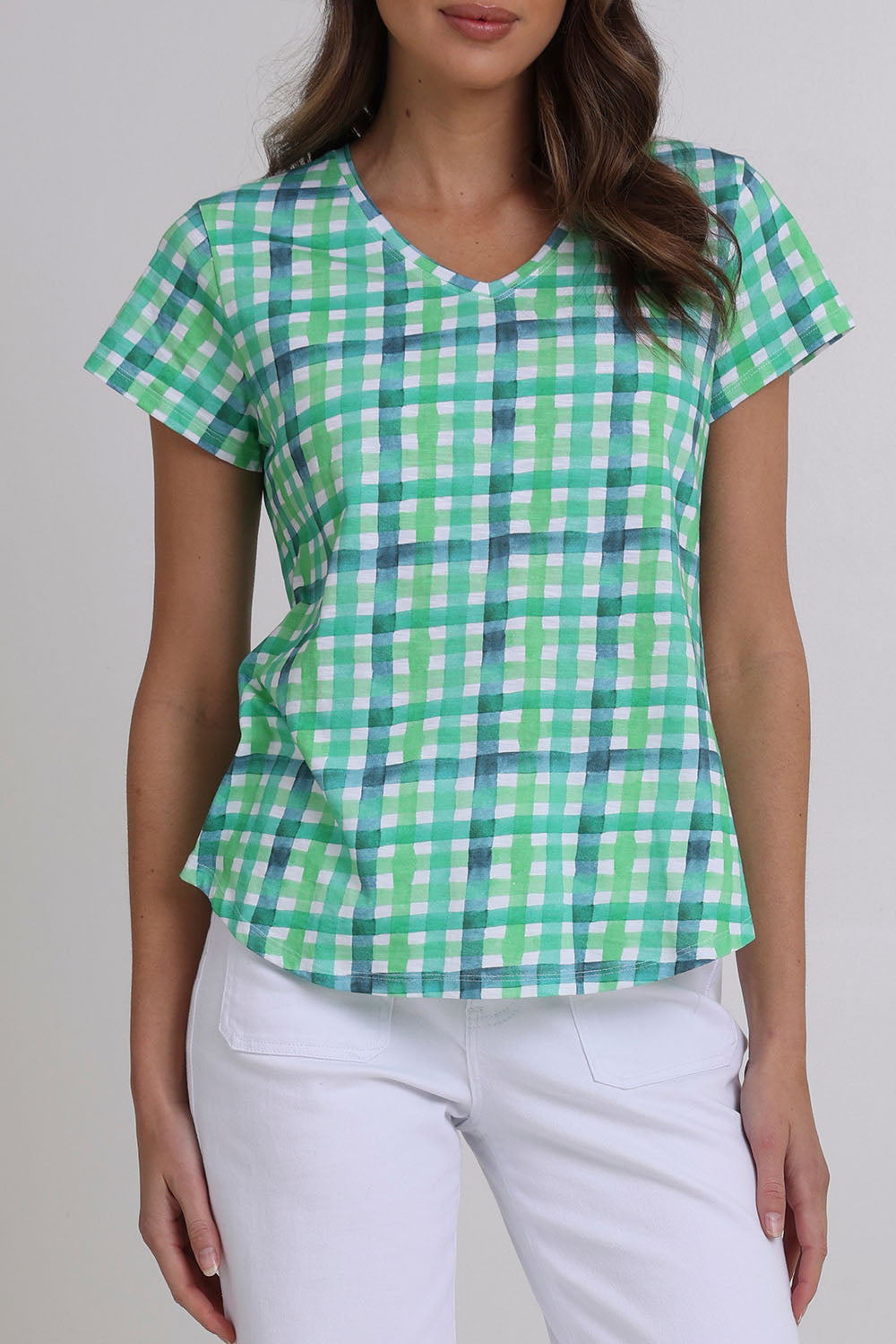 Model Madeline wearing size S of the Vs So Fine Cotton Tee in colour Edgy (Green), from the front, cropped image