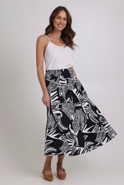 Model Madeline wearing size 10 of the Skirted Ahead Cotton Skirt in colour Bananas (Black), from the front, showing the whole outfit