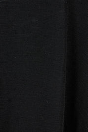Product shot of the Merino Raisin The Baa Sweater in colour Black (Black), detail