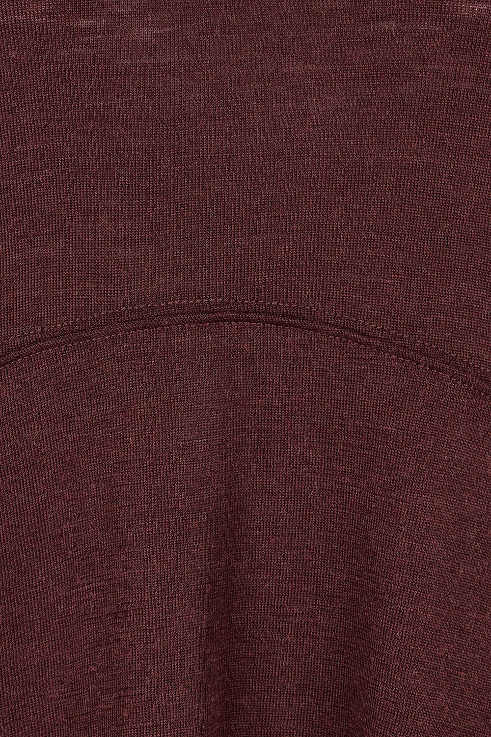 Product shot of the Merino Shear Ecstasy Dress in colour Raisin, detail