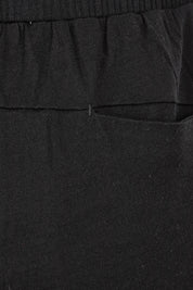 Product shot of the Merino Lazy Sunday Jogger in colour Black (Black), detail