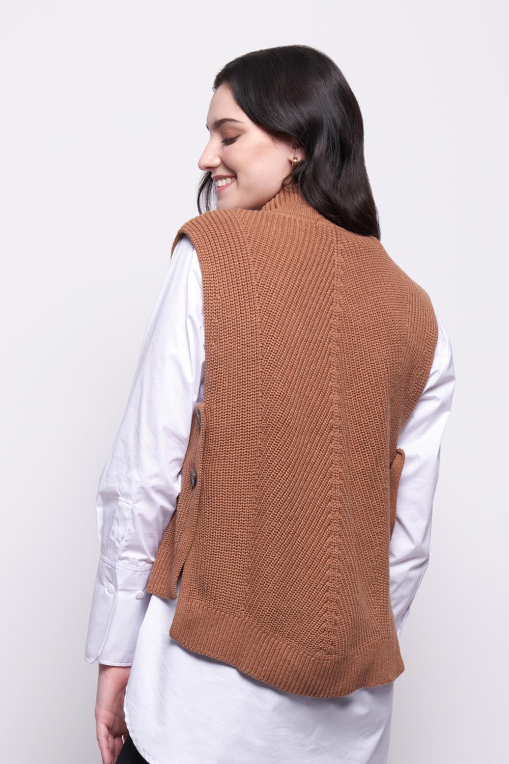 A model wearing the Cotton Cashmere Vest Ever Popover in colour Caramel, from the back