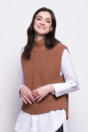 A model wearing the Cotton Cashmere Vest Ever Popover in colour Caramel, from the front, cropped image