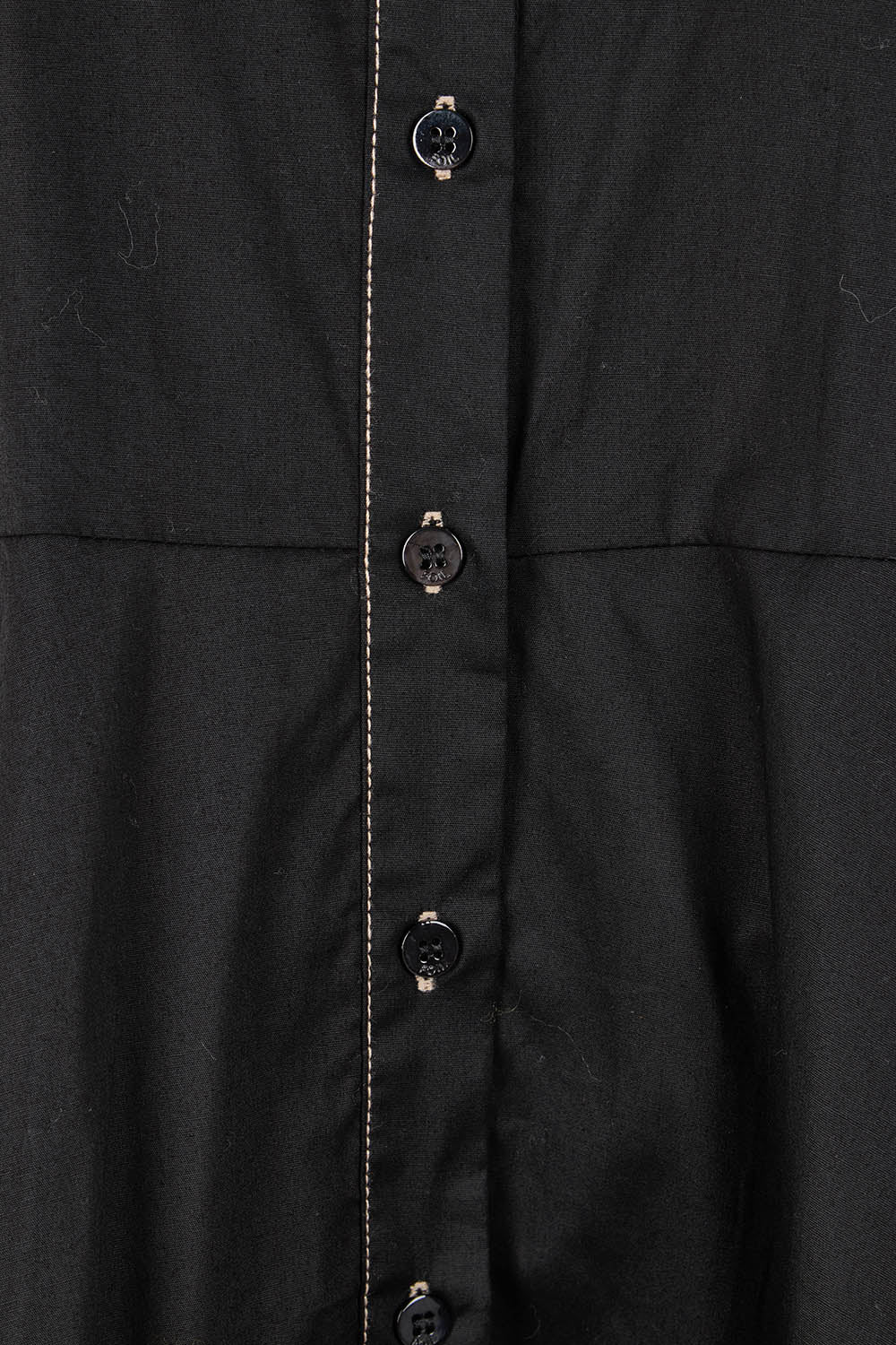 Product shot of the Honourable Mention Cotton Dress in colour Black (Black), detail