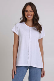 Model Madeline wearing size S of the Frill Factor Cotton Tee in colour White (White), from the front, cropped image