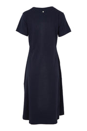 Product shot of the Stitch Together Cotton Dress in colour Truenavy (Blue), from the back