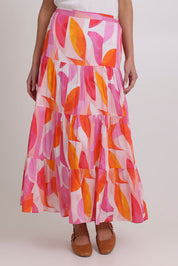 Model Madeline wearing size 10 of the Cruisin Cotton Skirt in colour Peachy (Pink), from the front, cropped image