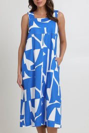 Model Madeline wearing size 10 of the Sunseeker Linen Cotton Dress in colour Reflection (Blue), from the front, cropped image