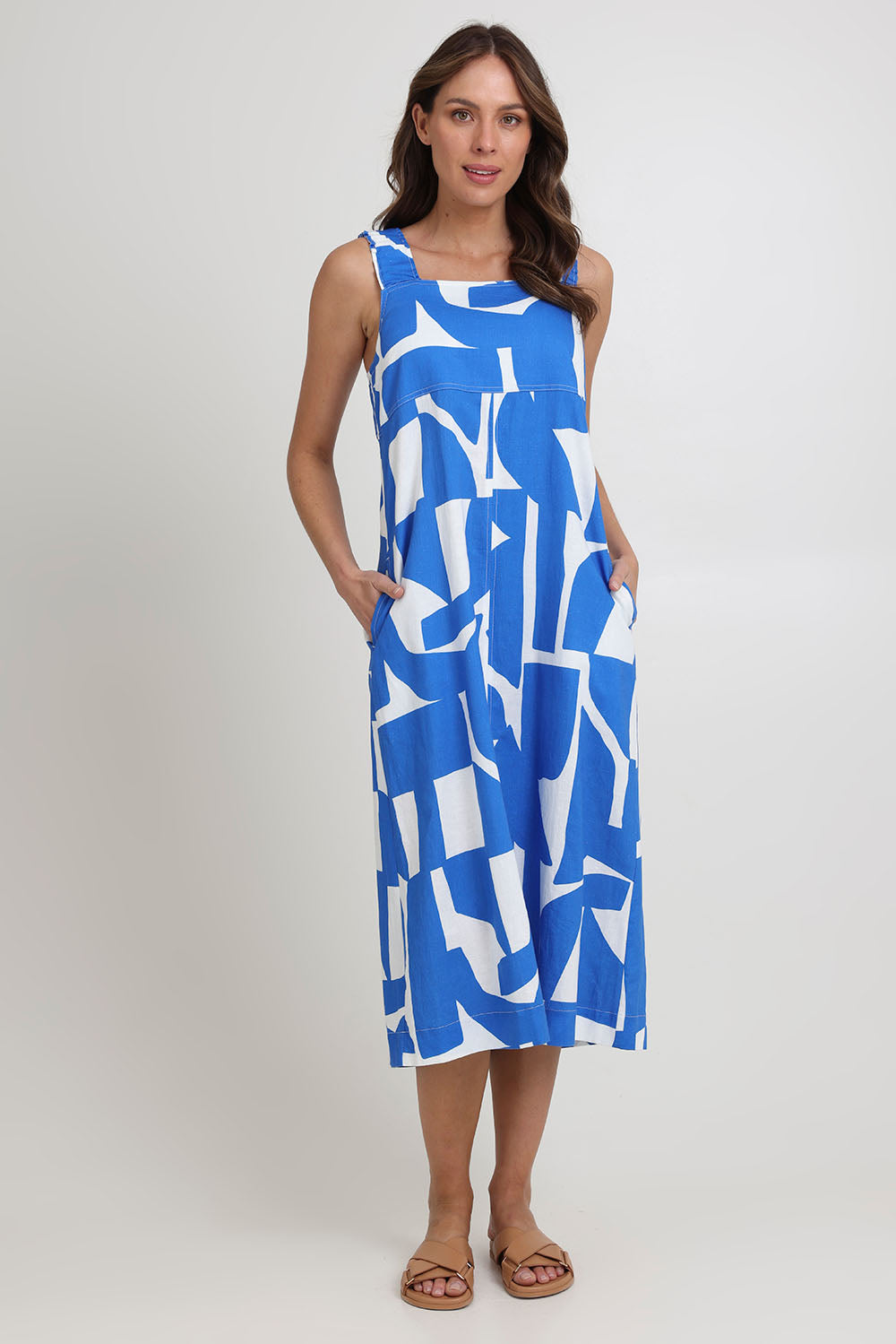 Model Madeline wearing size 10 of the Sunseeker Linen Cotton Dress in colour Reflection (Blue), from the front, showing the whole outfit