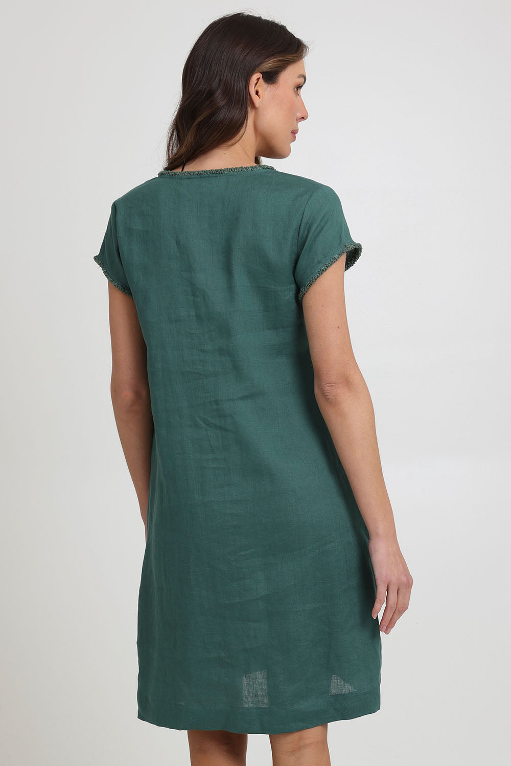Model Madeline wearing size 10 of the Festival Linen Dress in colour Thyme (Green), from the back