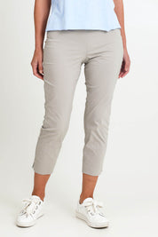 Model Riinar wearing size 10 of the Fuss Free 7/8 Pant – Barley in colour Barley, in a cropped view