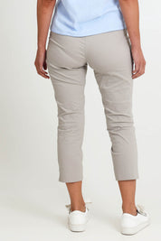 Model Riinar wearing size 10 of the Fuss Free 7/8 Pant – Barley in colour Barley, from the front