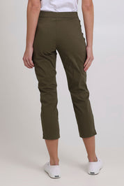 Model Madeline wearing size 10 of the Fuss Free 7/8 Pant in colour Kelp (Green), from the back
