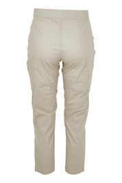 Product shot of the Fuss Free 7/8 Pant in colour Sand, from the back